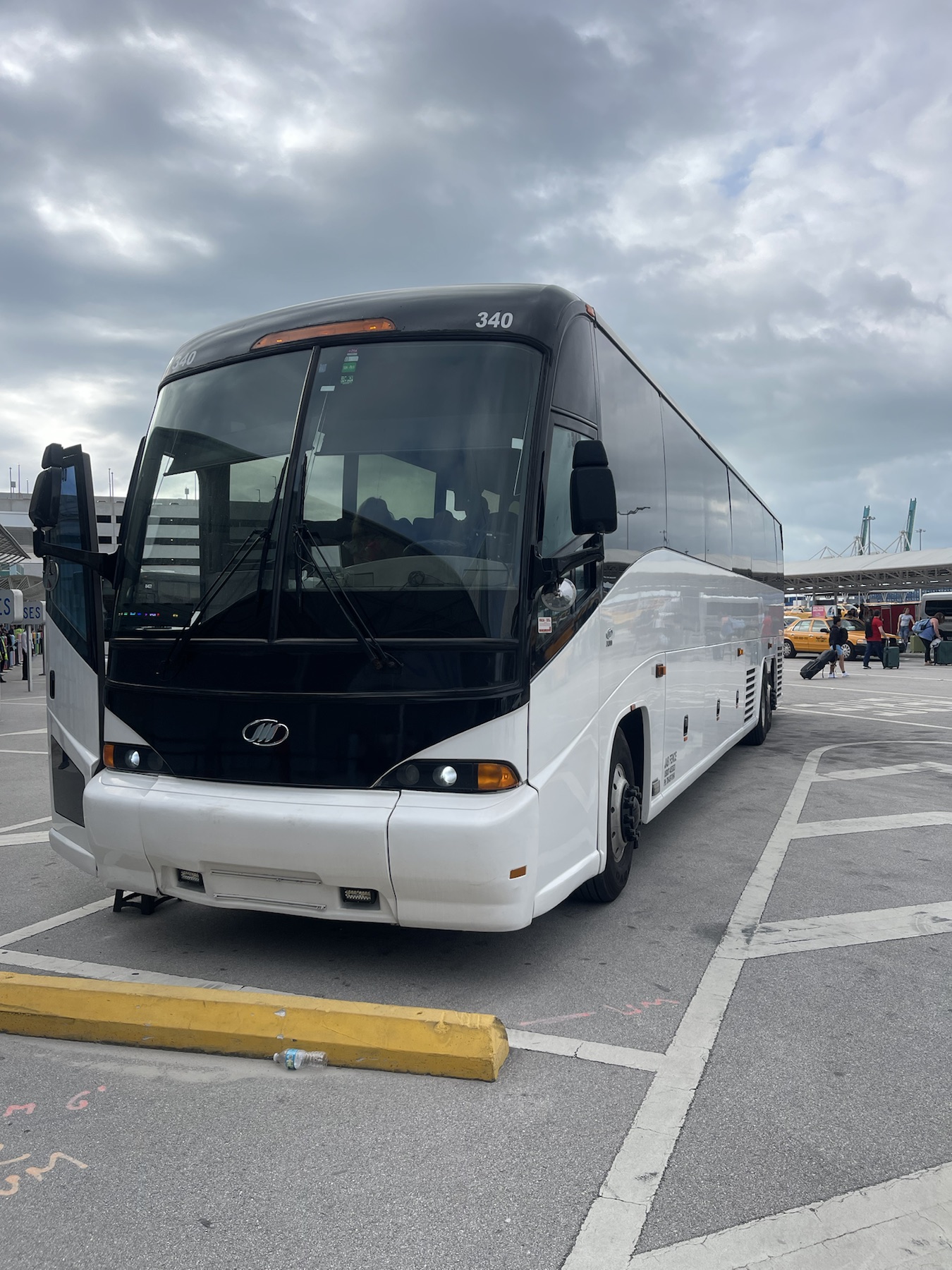 Coach bus parked near a transportation terminal