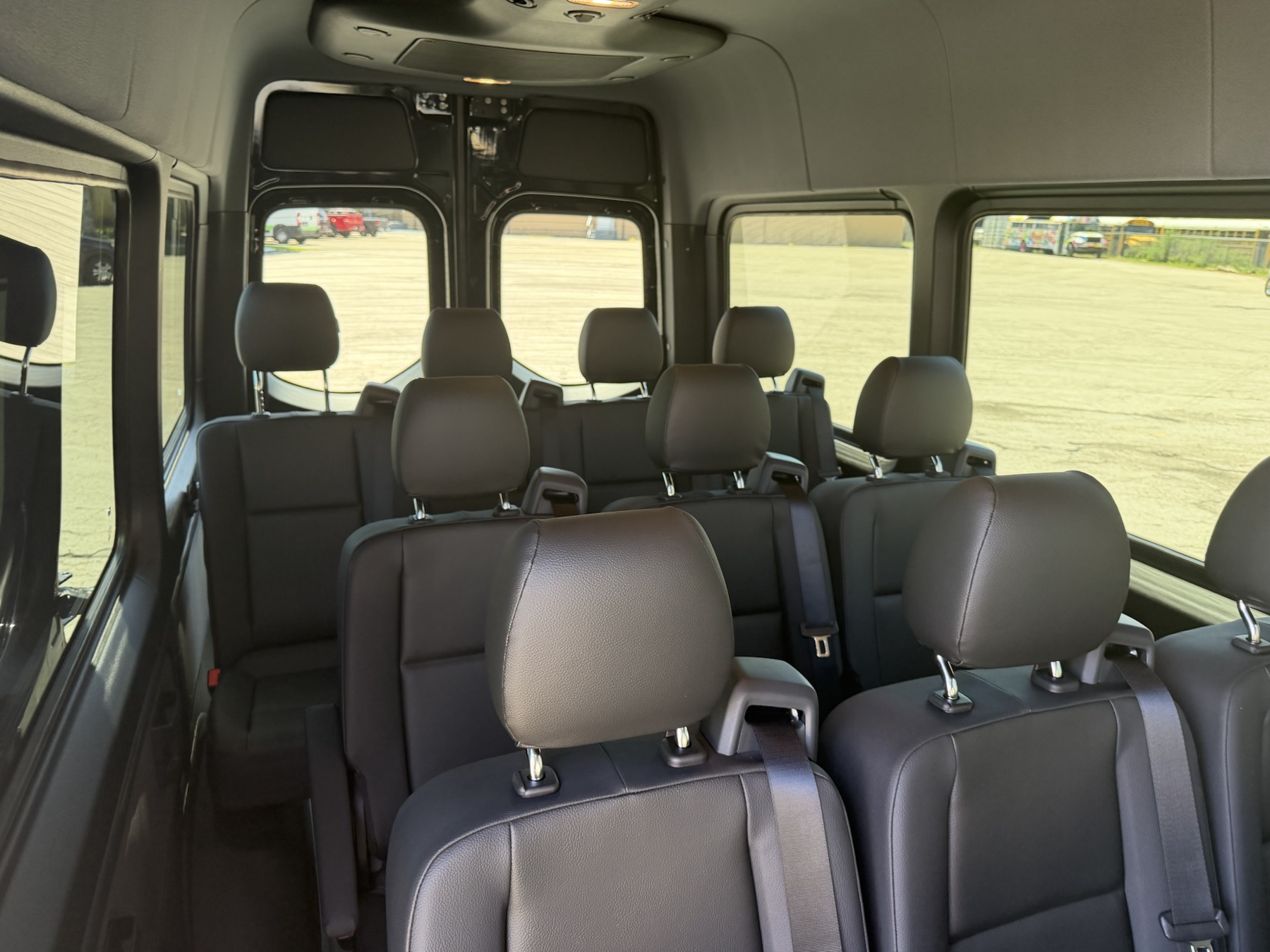 Detailed exterior view of the black Mercedes-Benz Sprinter van